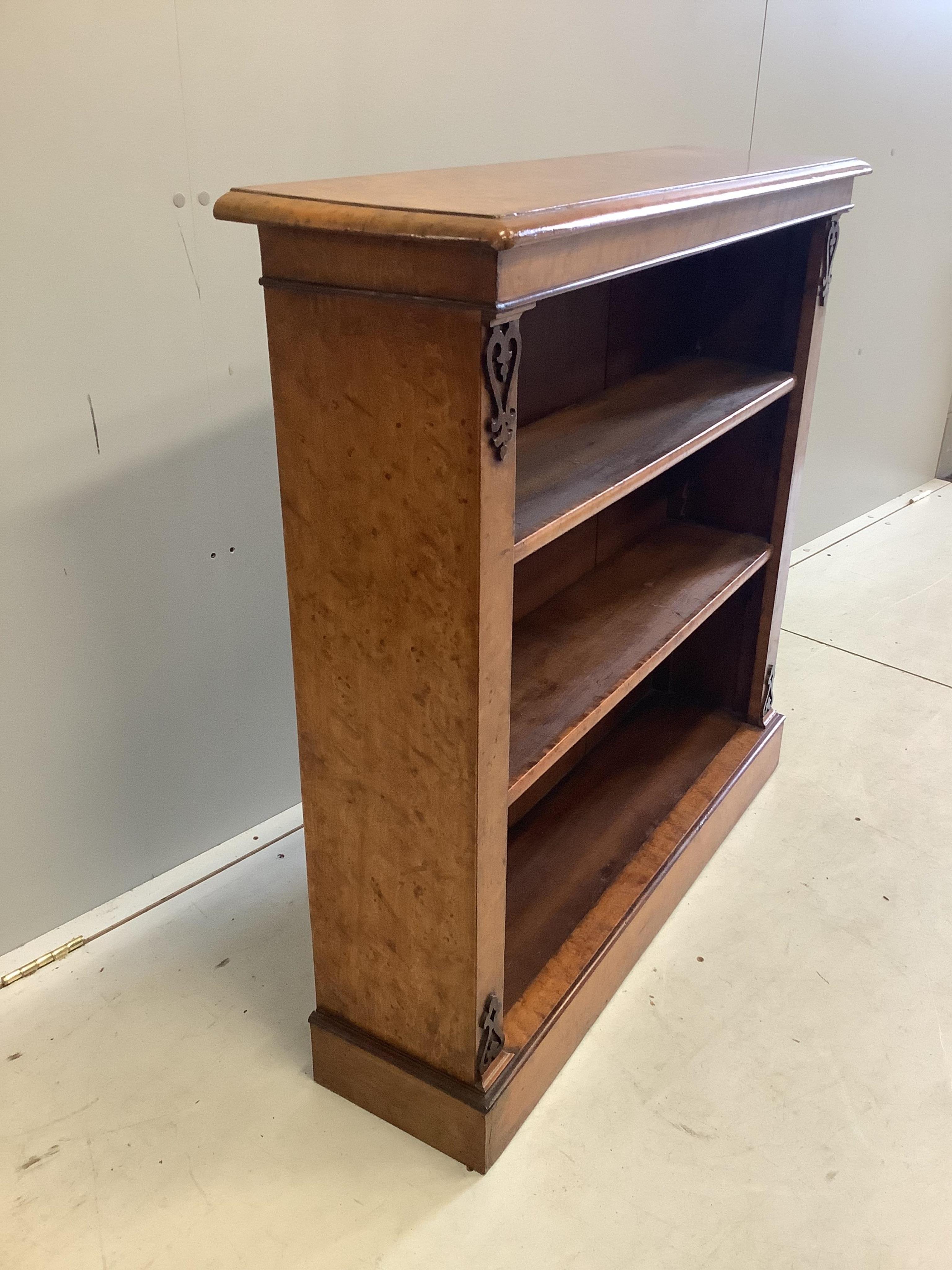 A Victorian bird's eye maple open bookcase, width 95cm, depth 27cm, height 94cm. Condition - good